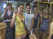 girls wave at the bison farm